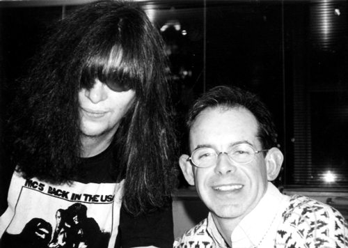 man behind Joey Ramone’s hair