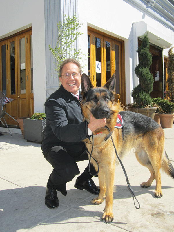 Scoopy's Notebook, Week of Feb. 21, 2019 2 Phil Mouquinho and Cairo in front of his former restaurant, P.J. Charlton, a few years ago. File photo by Lincoln Anderson