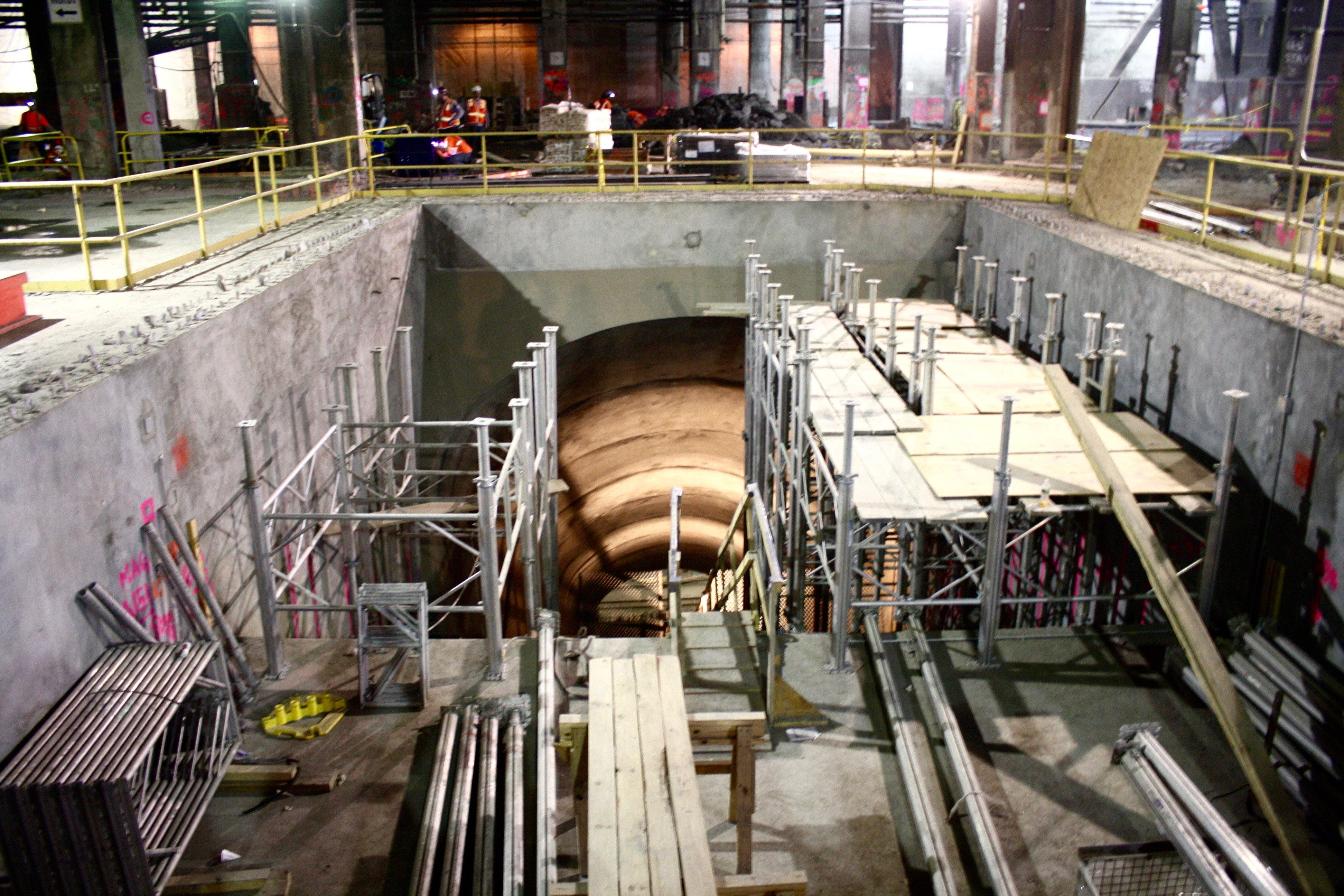 In “Caves” Below Grand Central, East Side Access Project on Track 5 Four escalator shafts lead down from the concourse to the mezzanine. | YANNIC RACK