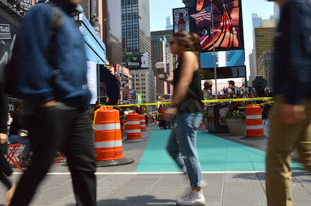 Designated Zones Open in Times Square, As Superheroes Ready a Legal Battle 4 One of the “Techno Teal”-painted DAZs, at 46th Street and Broadway, with the installation barriers and yellow take not yet removed. | JACKSON CHEN