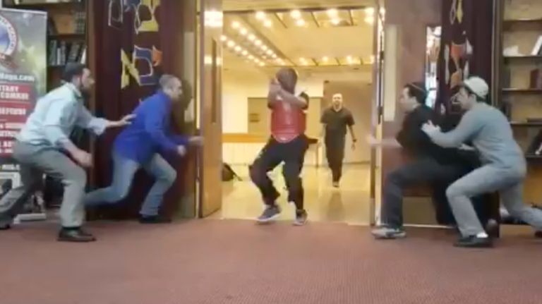 Congregants of a synagogue learn how to stop and restrain an active shooter as part of a training program provided by Avi Abraham.