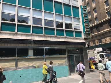 The big "Friends" billboard at 503 Broadway has received neighbor complaints and a DOB violation. (Photo by Gabe Herman)