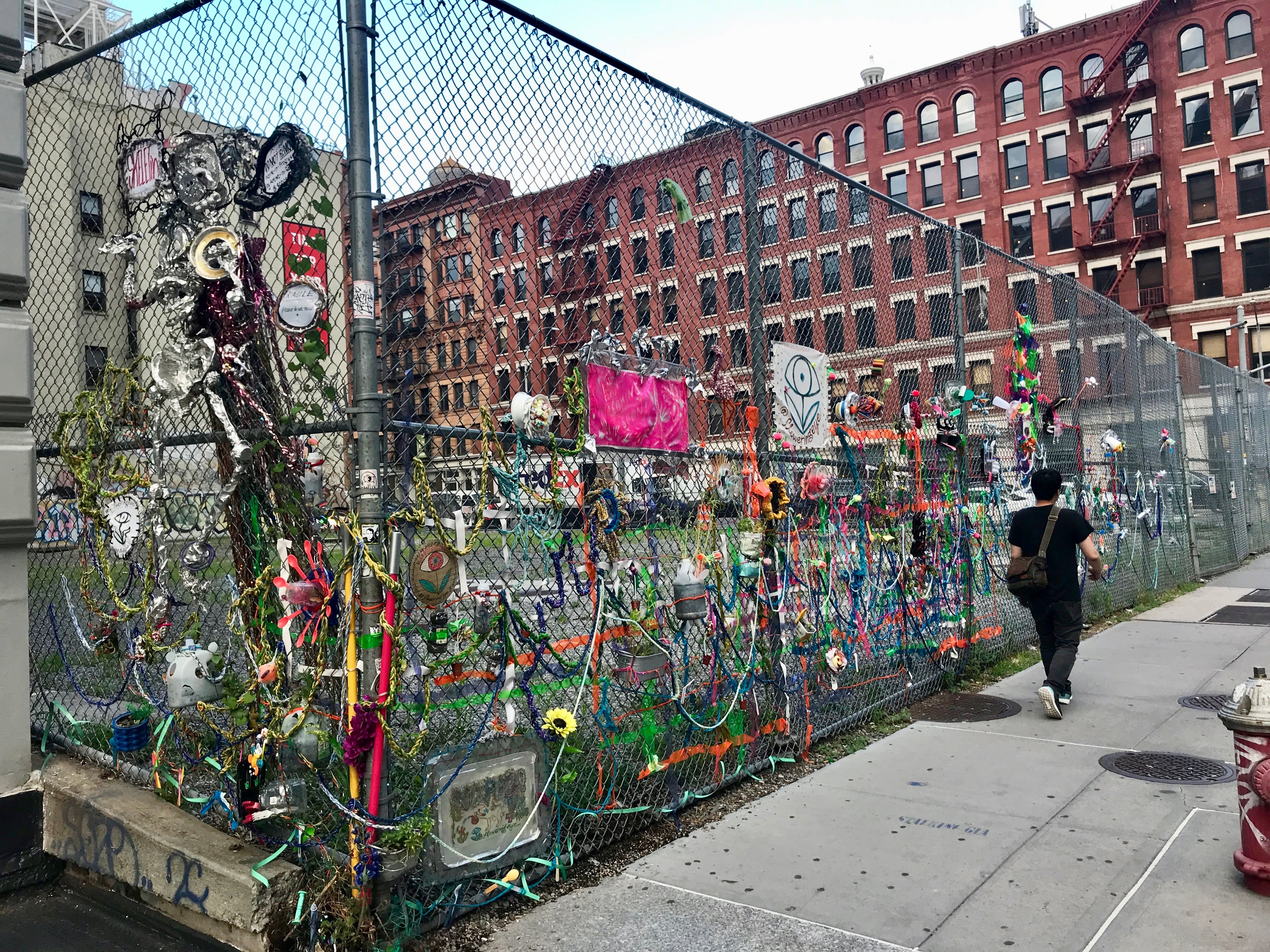 Street art in Soho livens up vacant city lot with colorful collages, providing something 'light, happy and unexpected' 3