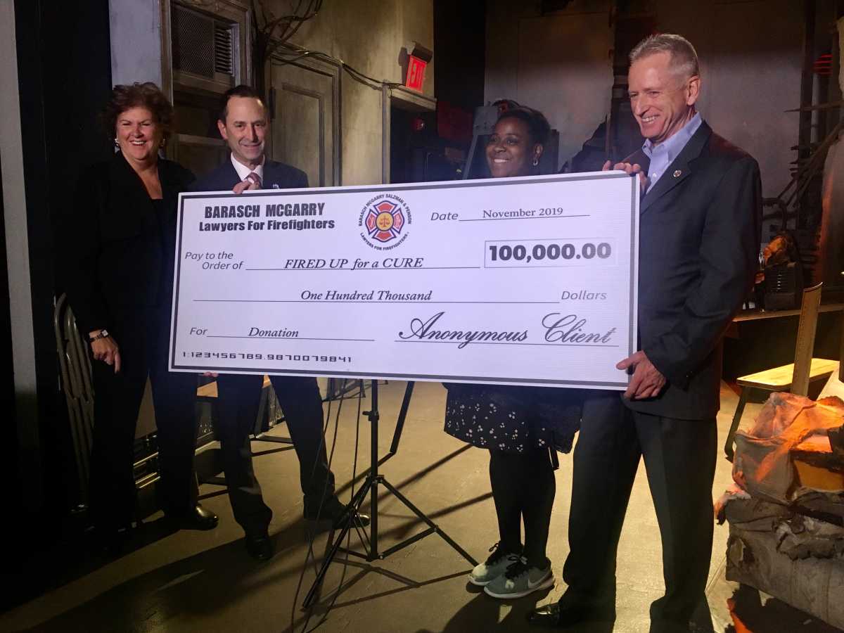 $100K check presented to FDNY cancer charity 1 CHECK PRESENTATION COURTESY BARASCH MCGARRY