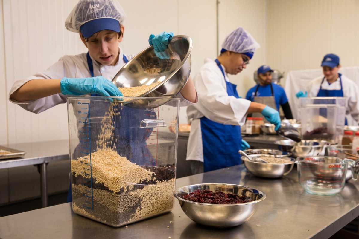 Luv Michael creates organic granola and opportunities for people with autism 1 Granologists working to create Luv Michael’s granola Courtesy Luv MIchael