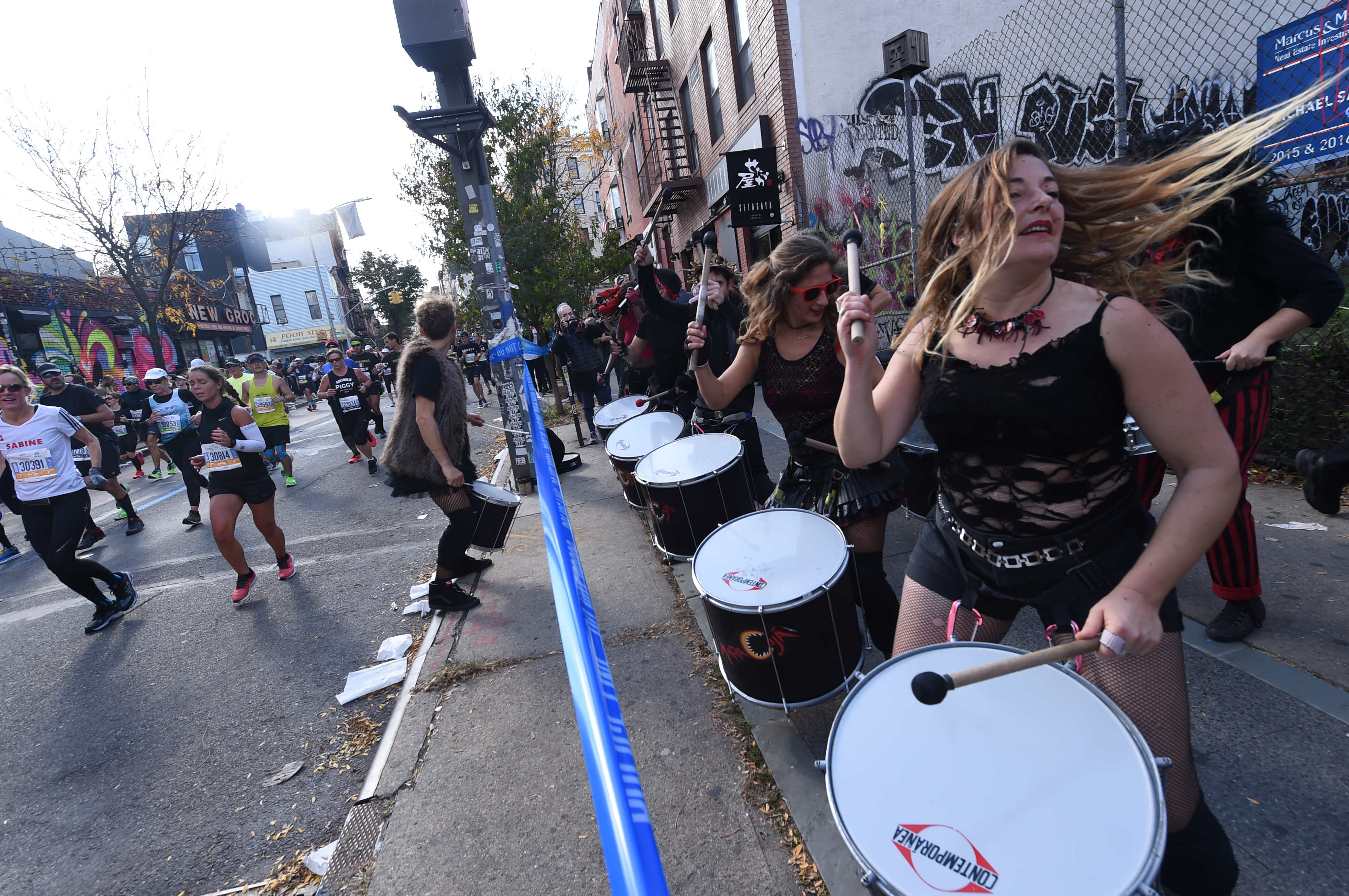 52,000 runners brave cool temperatures through five boroughs in NYC Marathon 9
