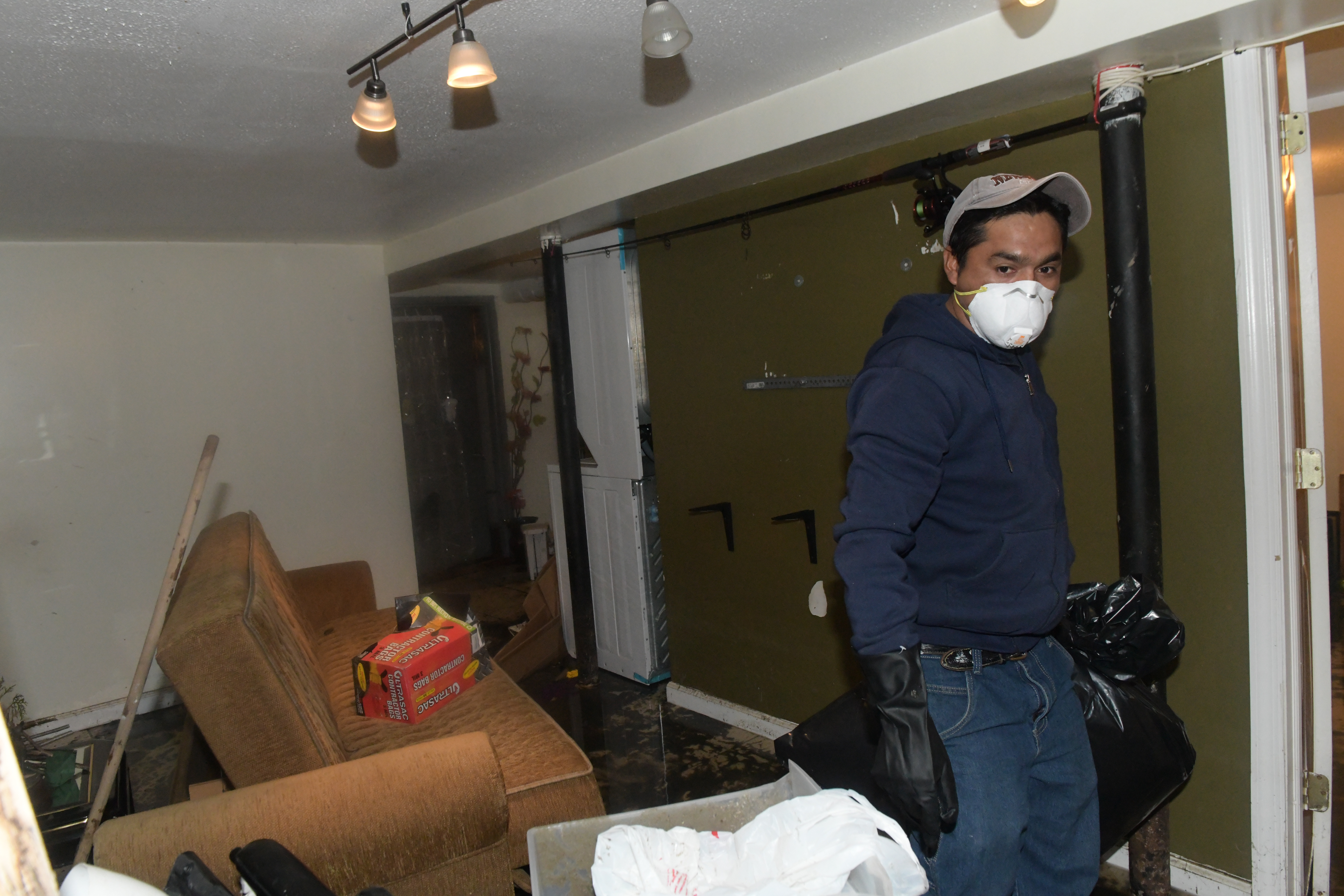 'Everything in there is gone': Queens homes ruined by massive sewage spill 9