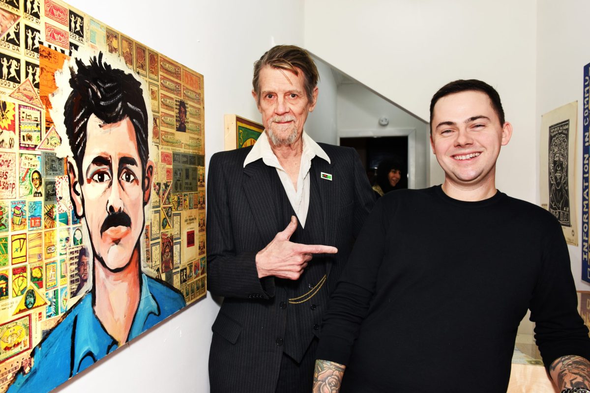 A profile of Ed Higgins, artist with unique marketing styles 5 Ed Higgins III, left. Apt. Gallery owner Brendan Brulon, right. Large painting is a Higgins self portrait.