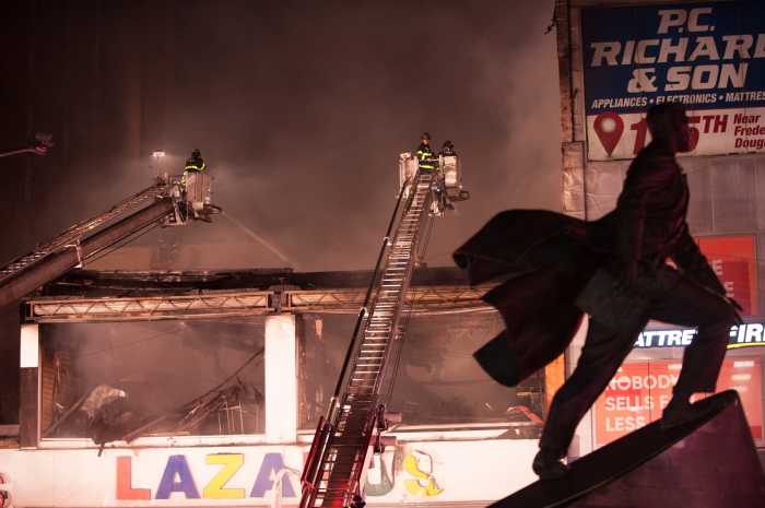 Three-alarm fire rips through Harlem retail strip already wracked by COVID-19 closures 5