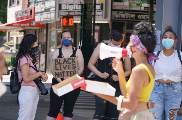 Activists in Queens call for justice and encourage residents to vote during Election Day protest 7