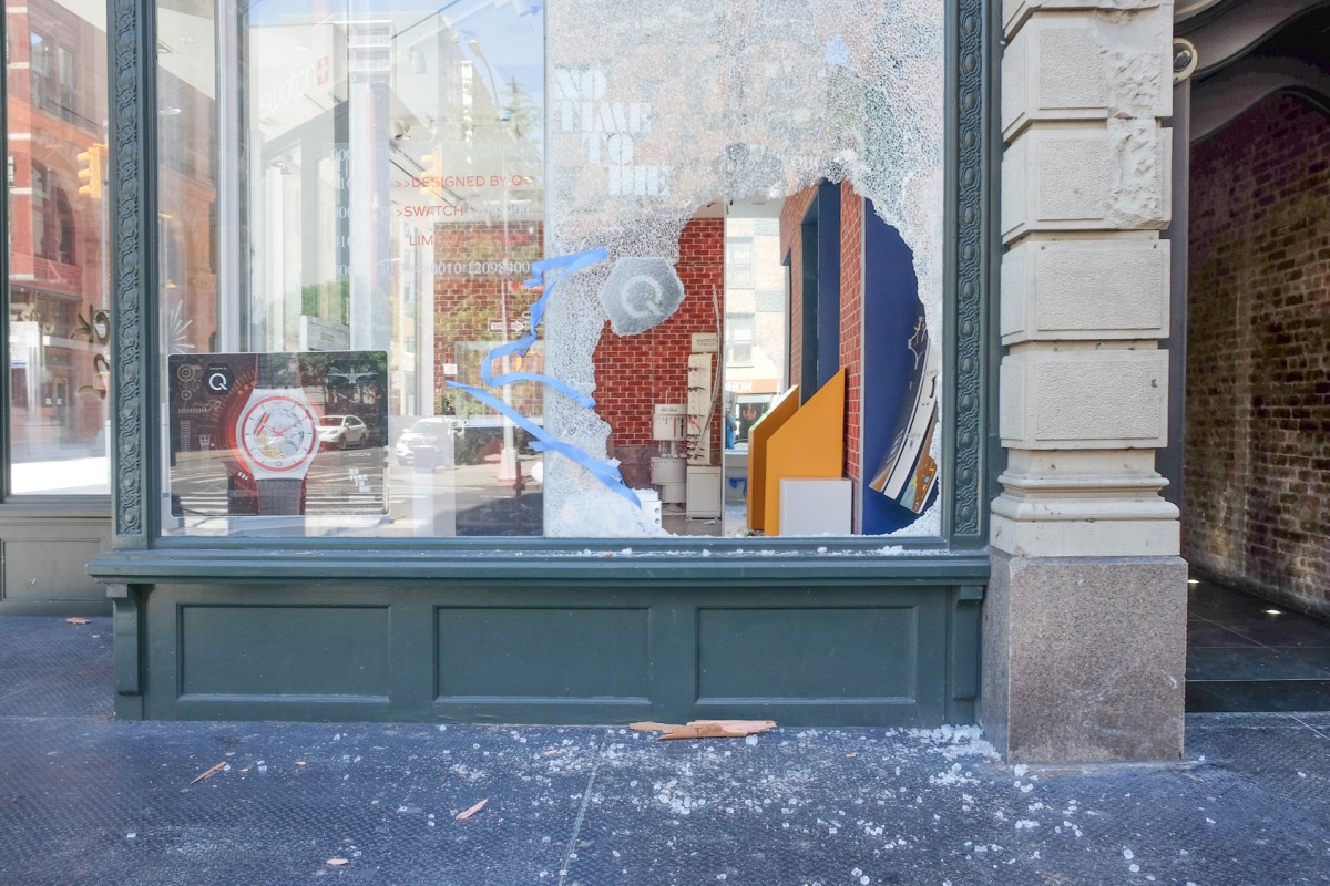 SoHo, Greenwich Village businesses dealing with fallout from city-wide looting 3 A broken window at Swatch on Broadway