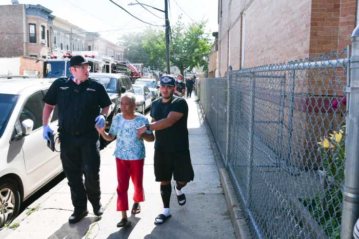 Off-duty paramedic, firefighter rescues two from burning Queens home 7