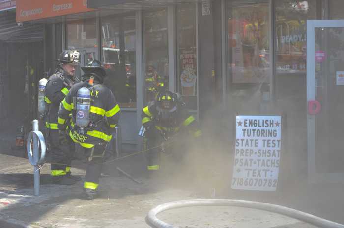 Three-alarm inferno hits Queens shopping strip, four firefighters hurt 14
