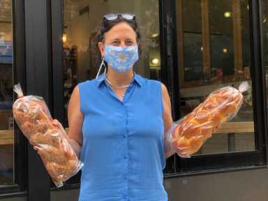 Tribeca's Grandaisy Bakery serves up specialty challah for Rosh Hashanah 33 Wearing a daisy-themed mask, founder and owner of Tribeca's Grandaisy Bakery shows off challah, the latest in her baked goods line. (Photo by Tequila Minsky)