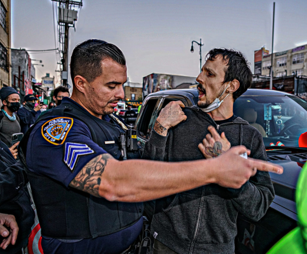 Protesters march from Brooklyn to Queens against police unions and QAnon 6