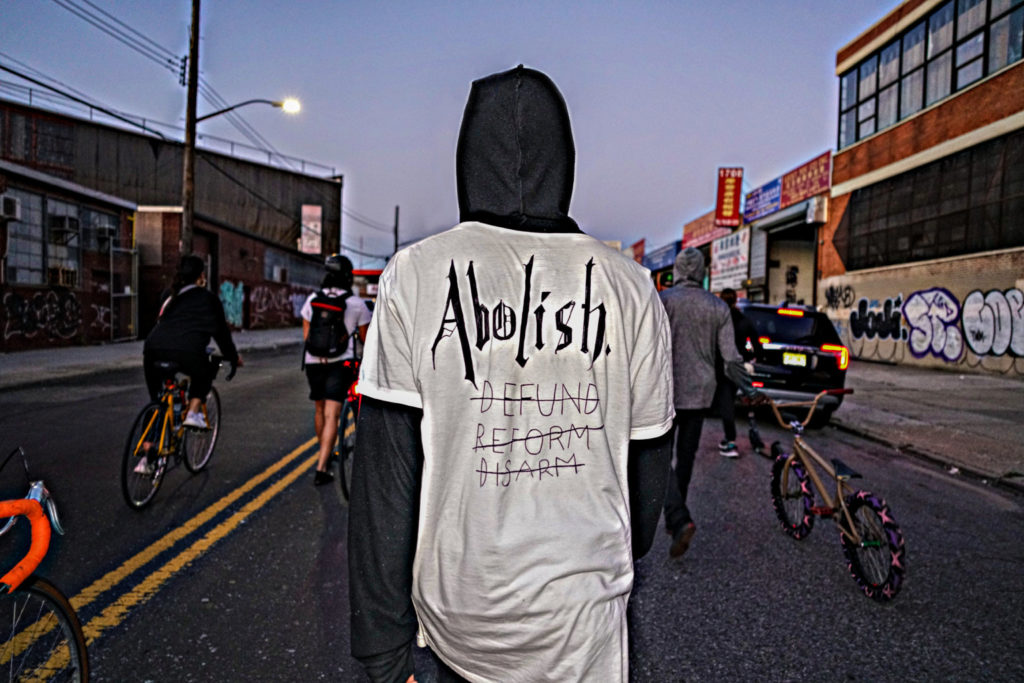 Protesters march from Brooklyn to Queens against police unions and QAnon 7