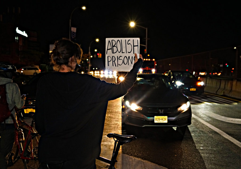 Protesters march from Brooklyn to Queens against police unions and QAnon 9