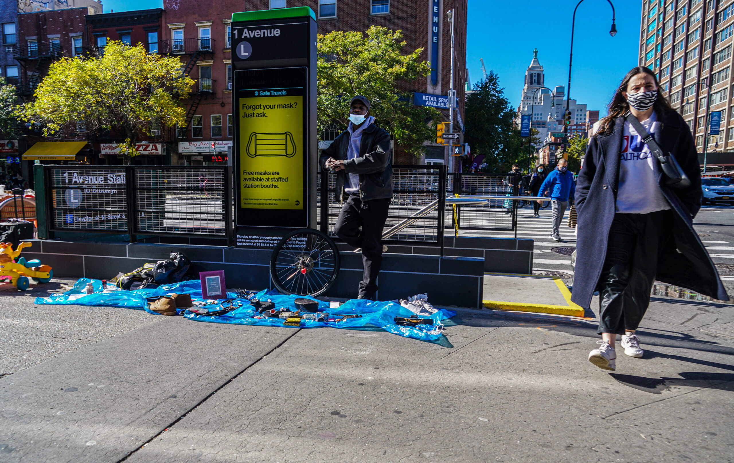 A vendor set up near the entrance to the First Avenue L train station in the East Village.