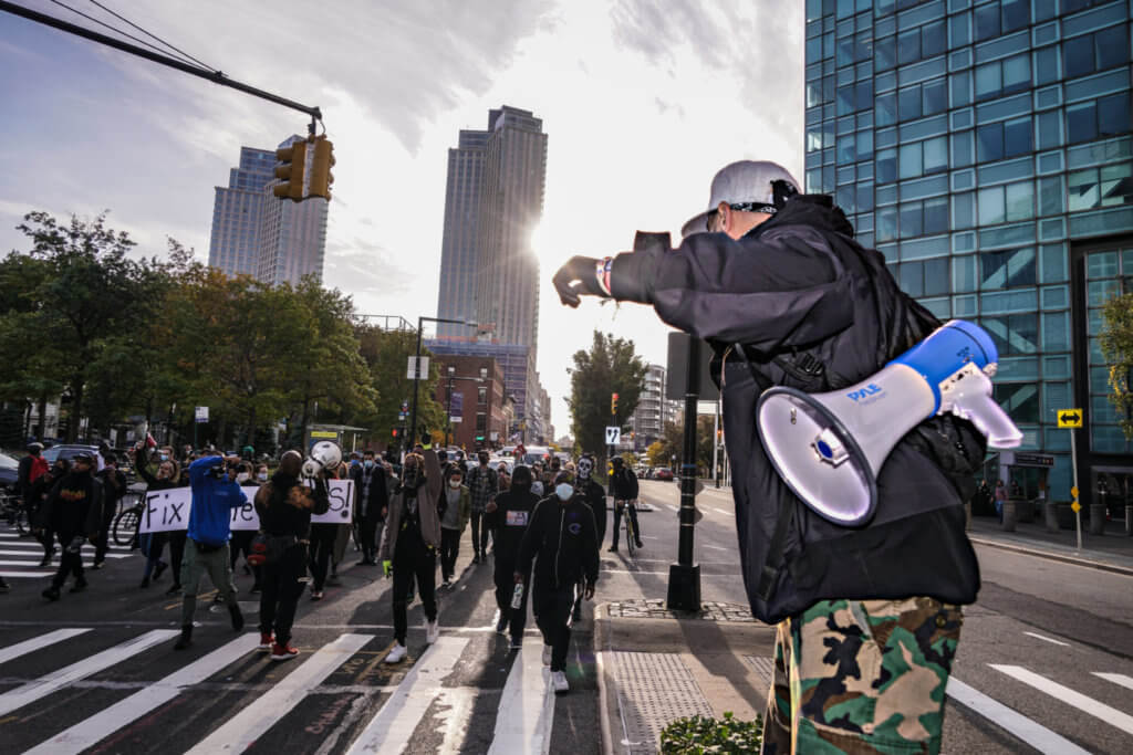 Demonstrators call on NYCHA to restore cooking gas at Astoria Houses in Queens 4