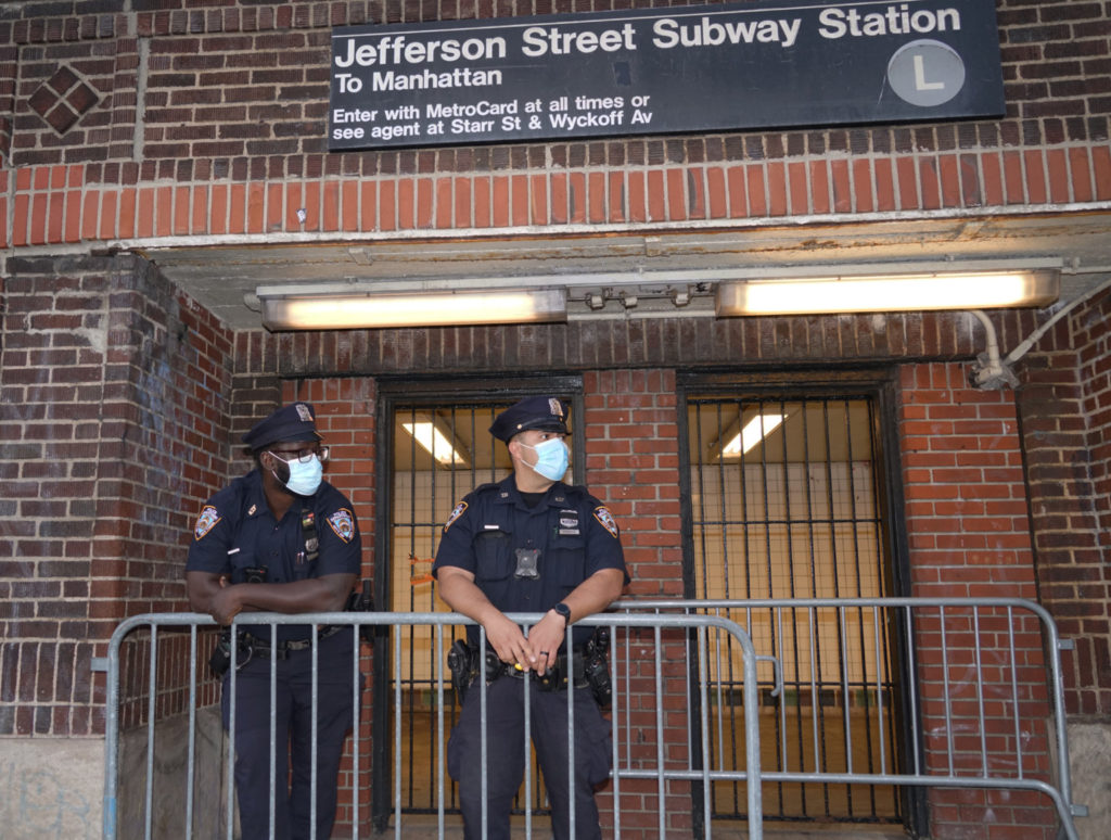 Protesters march from Brooklyn to Queens against police unions and QAnon 3