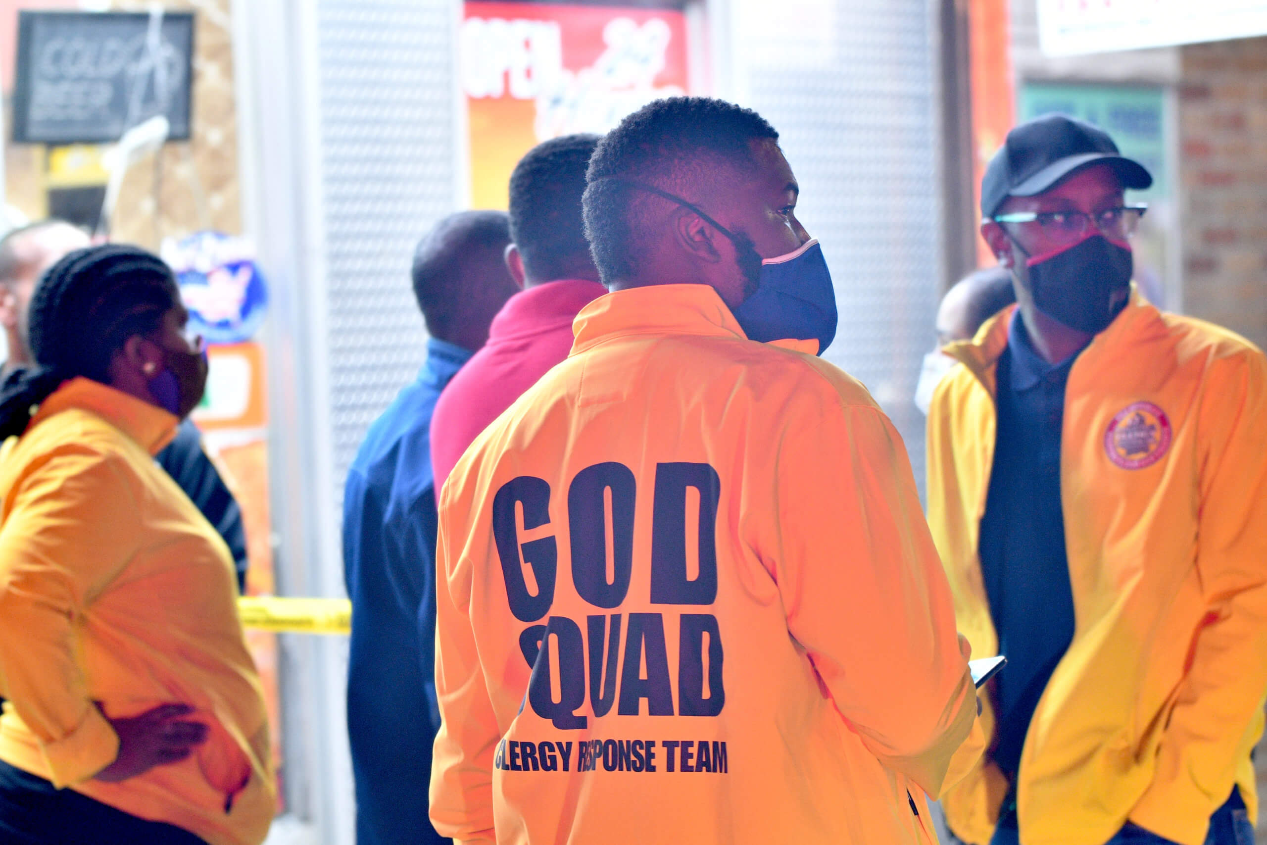 God Squad Clergy Response team at the scene of a triple shooting on East 49 Street