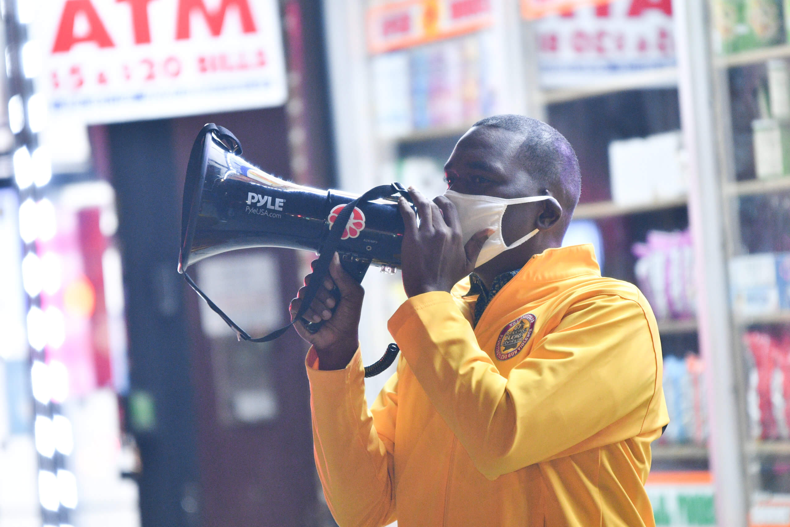 Pastor Gil Monrose of the God Squad Clergy Response team at the scene of a triple shooting on East 49 Street