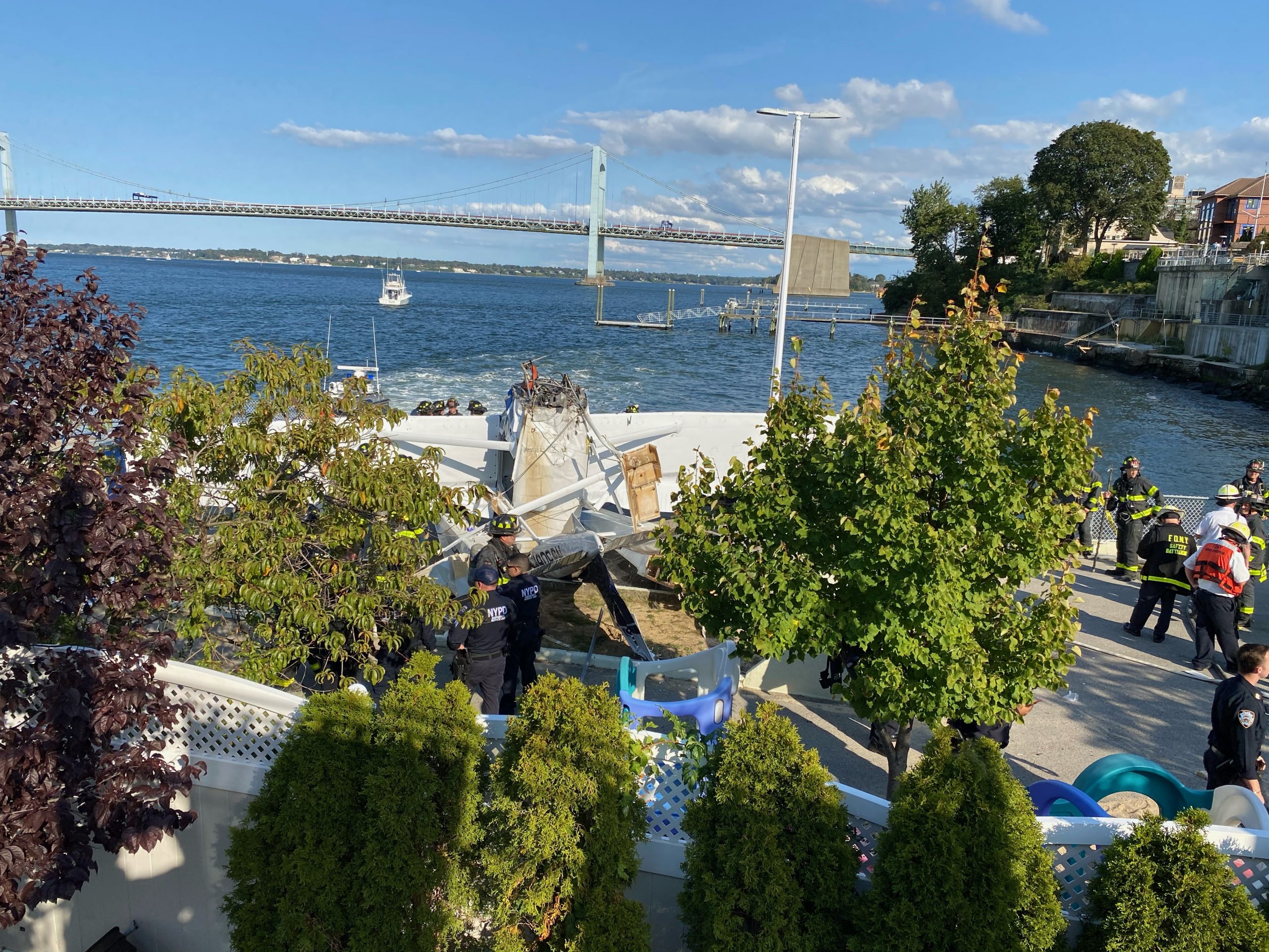 BREAKING: Seaplane crashes into Queens pier, killing woman, critically injuring two men 3