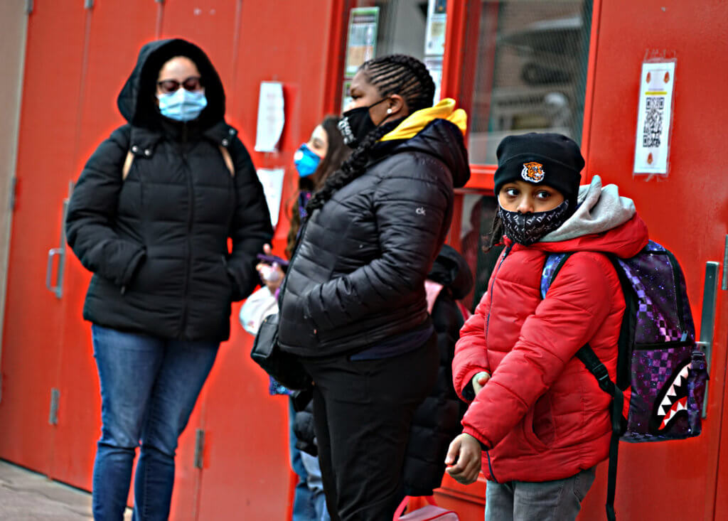 UFT welcomes elementary students return back to school 4 Parents and children wait for the first day of in-person learning to officially start.