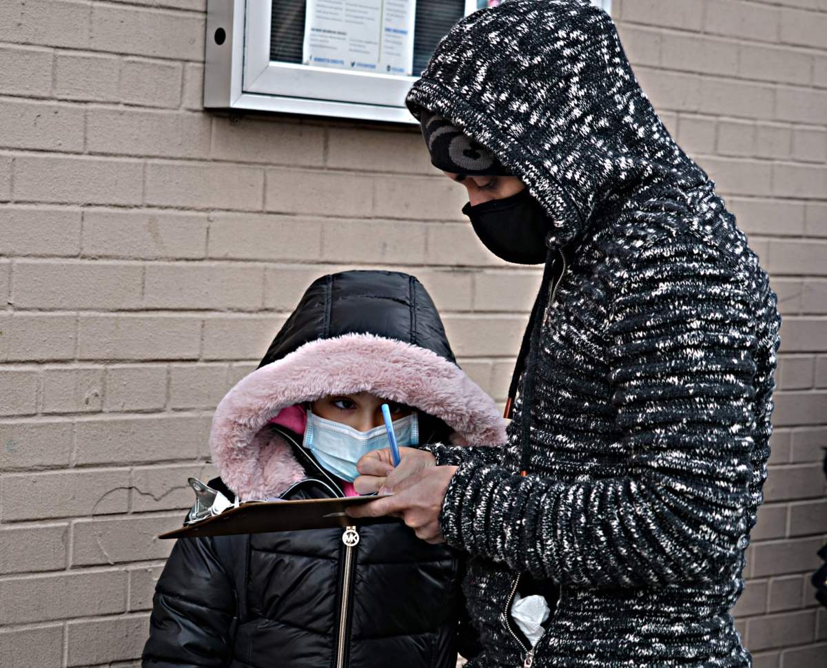 UFT welcomes elementary students return back to school 3 Parents signed release forms prior to the children entering the school.