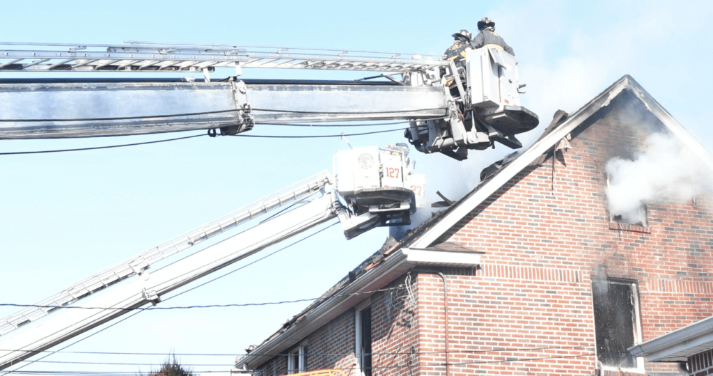 Firefighters battle blaze in three-story home in Queens 2