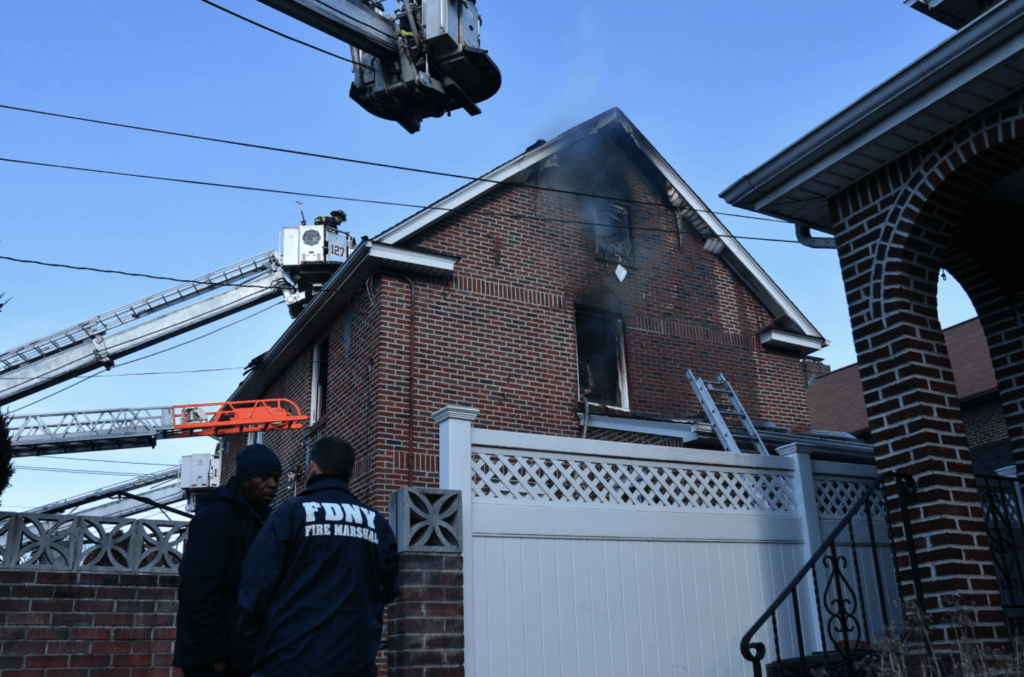 Firefighters battle blaze in three-story home in Queens 3