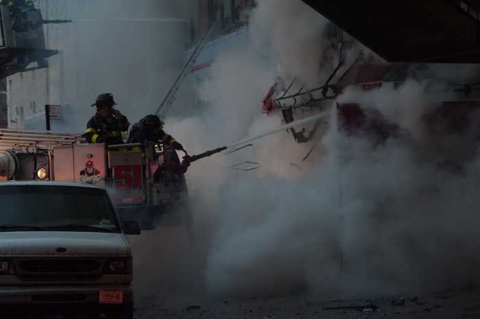Three-alarm fire rips through multiple Bronx stores, man cuffed for groping EMT at the scene: FDNY 9
