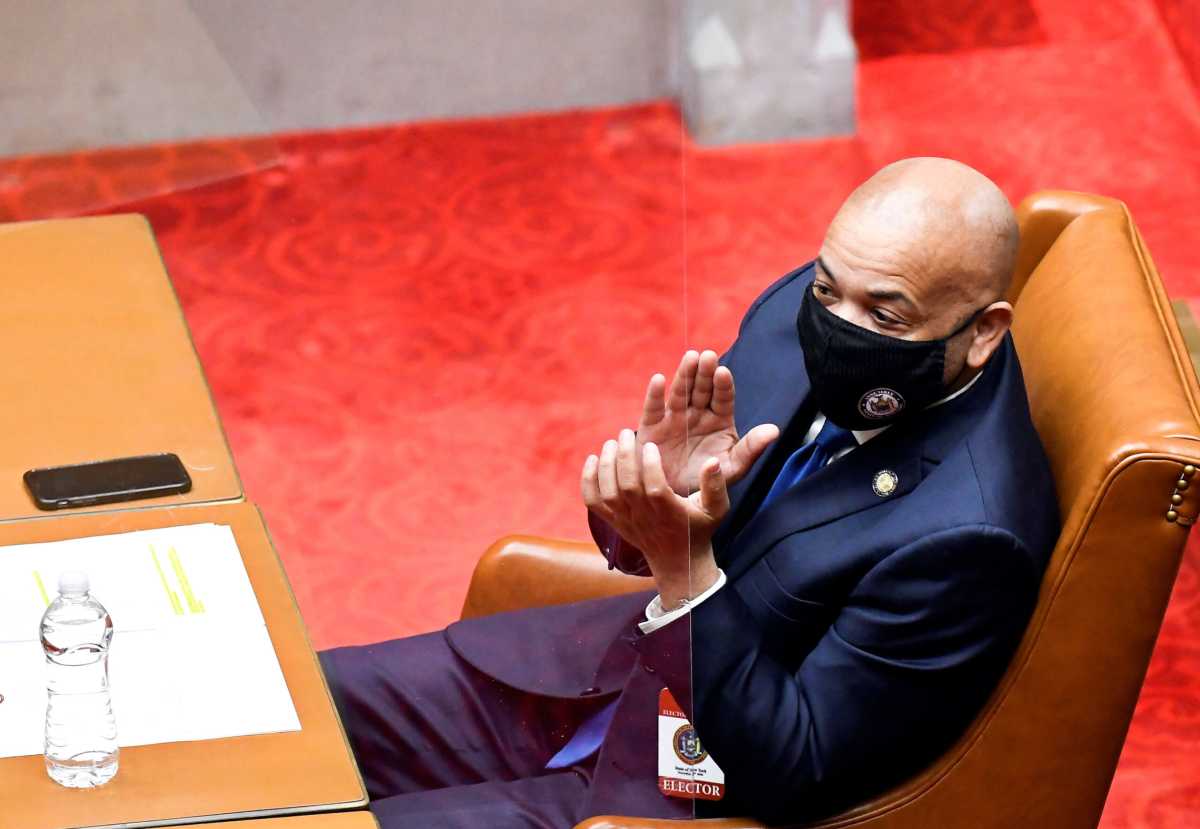FILE PHOTO: Electors gather to cast their votes for the U.S. presidential election at the State Capitol in Albany