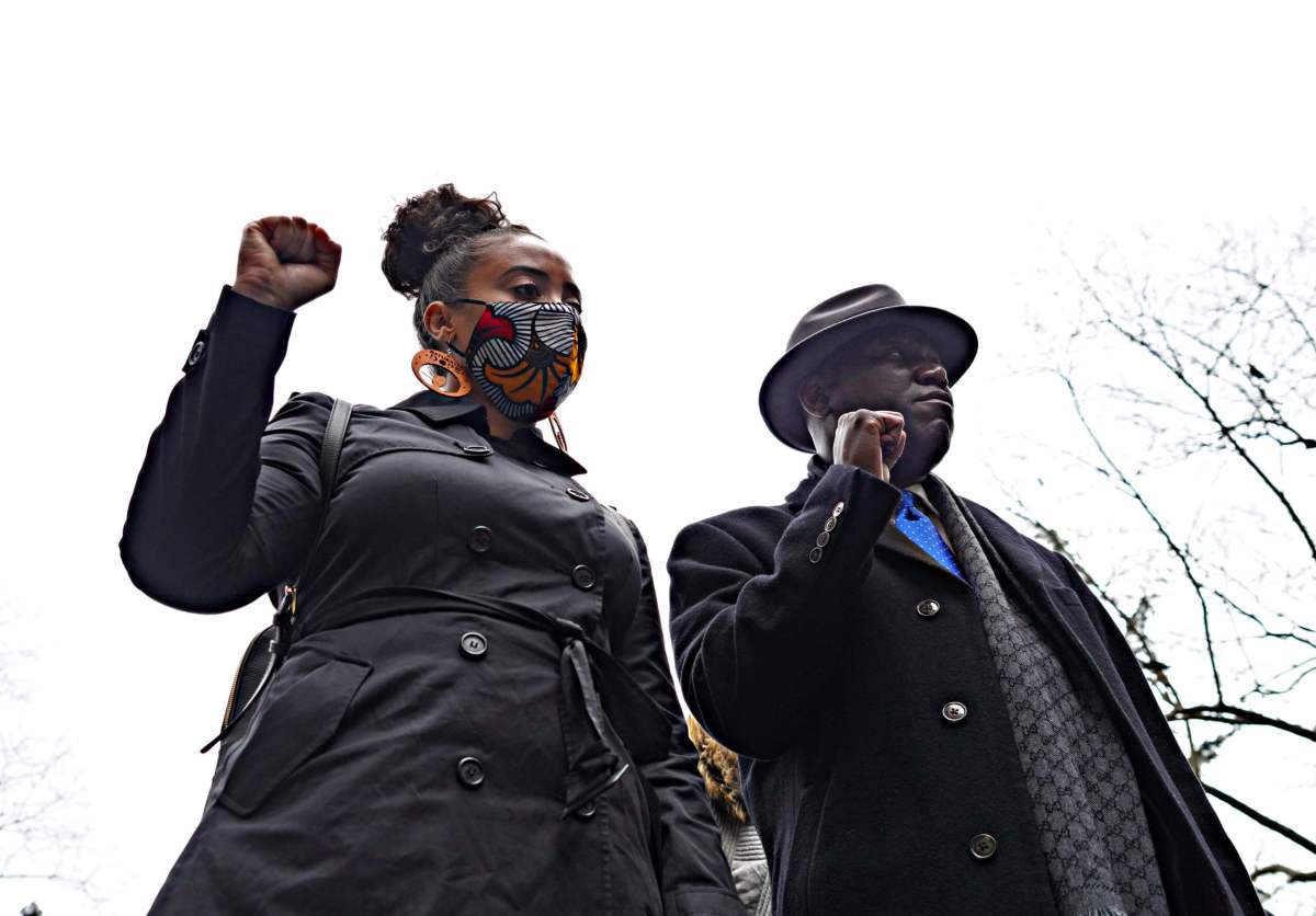 Family sues Soho's Arlo Hotel for racial profiling after teen was falsely accused and attacked for theft 2 Katty Rodriguez and Ben Crump raise their fists up for justice