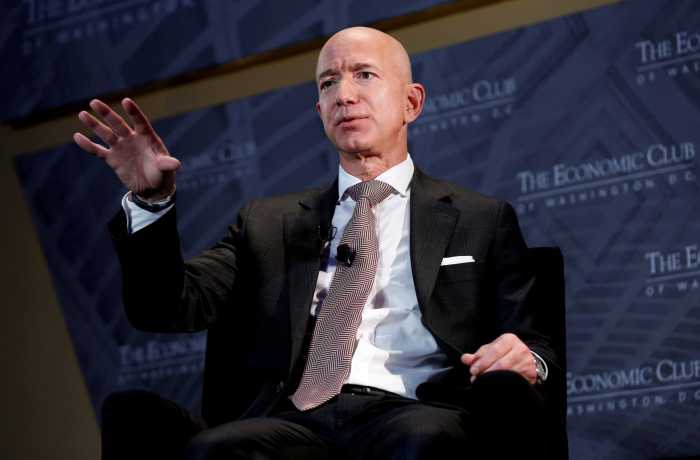 Bezos, Musk top Forbes' record-setting billionaire list 4