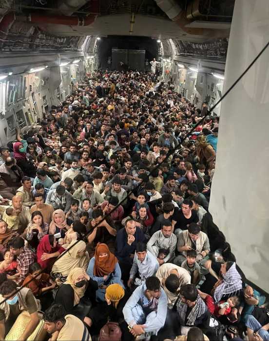 Over 600 Afghanistan refugees cram into U.S. cargo plane in desperate flight from Kabul 3