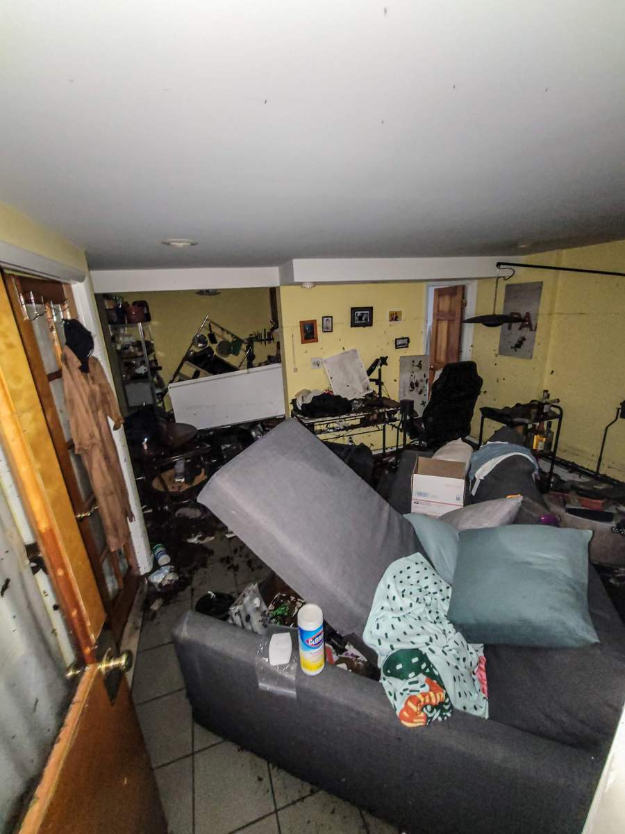 'It broke the door in!' Queens residents recount terrifying night of flooding 10 Kurani's living room is ruined