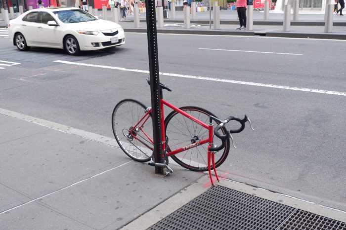 Can you lock your bike to a NYC street sign? DOT chief won't say 2 A bike locked up at a street