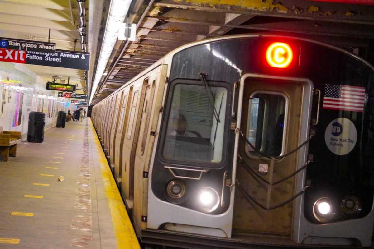 A C train arriving at the Clinton-Washington Avenues station