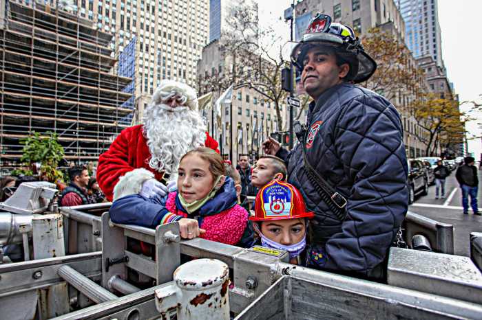 Families of fallen FDNY members enjoy early holiday celebration in Midtown 8
