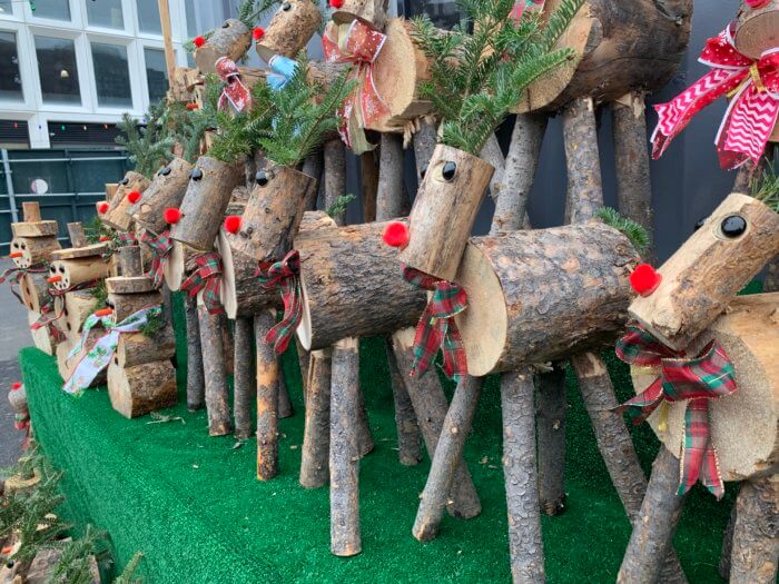 This Queens native runs some of the largest Christmas tree stands in New York City 9 The wooden reindeer for sale at Greg's Tree's holiday market.