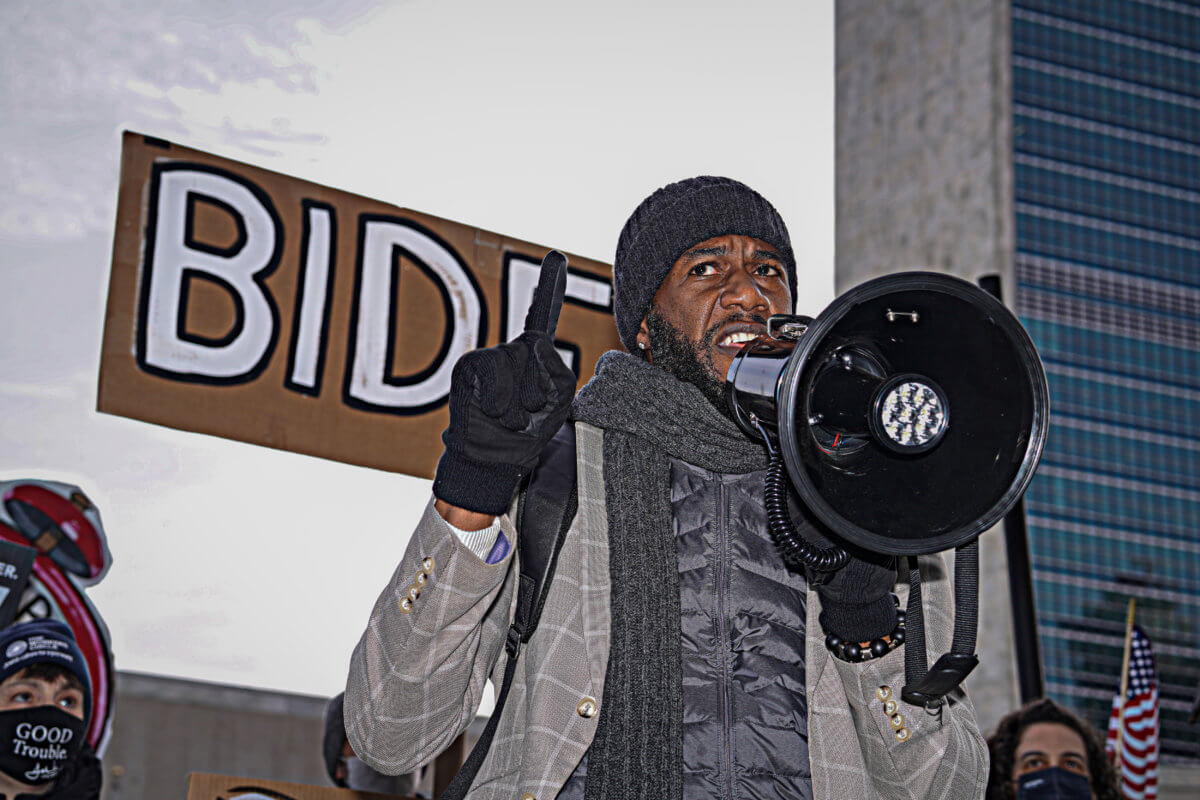 'Everybody thinks it can't happen here until it does': Protesters outside UN hold fake funeral for democracy, voting rights in America 8