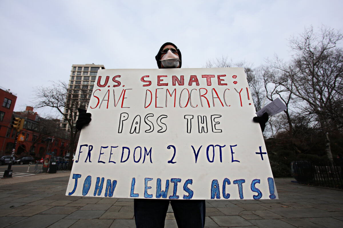 'Our democracy is sacred': Candlelight vigil on Upper East Side remembers Jan. 6 Capitol attack 16