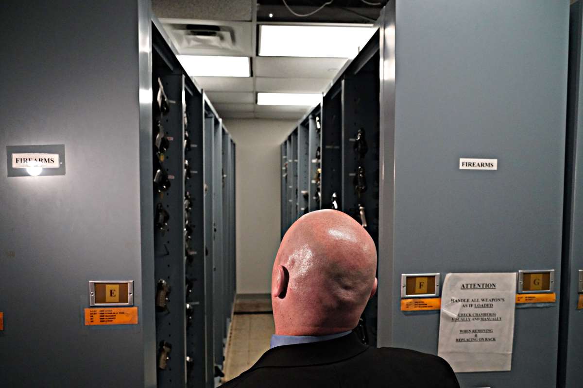 Captain Matthew Strong opens the gun lockers