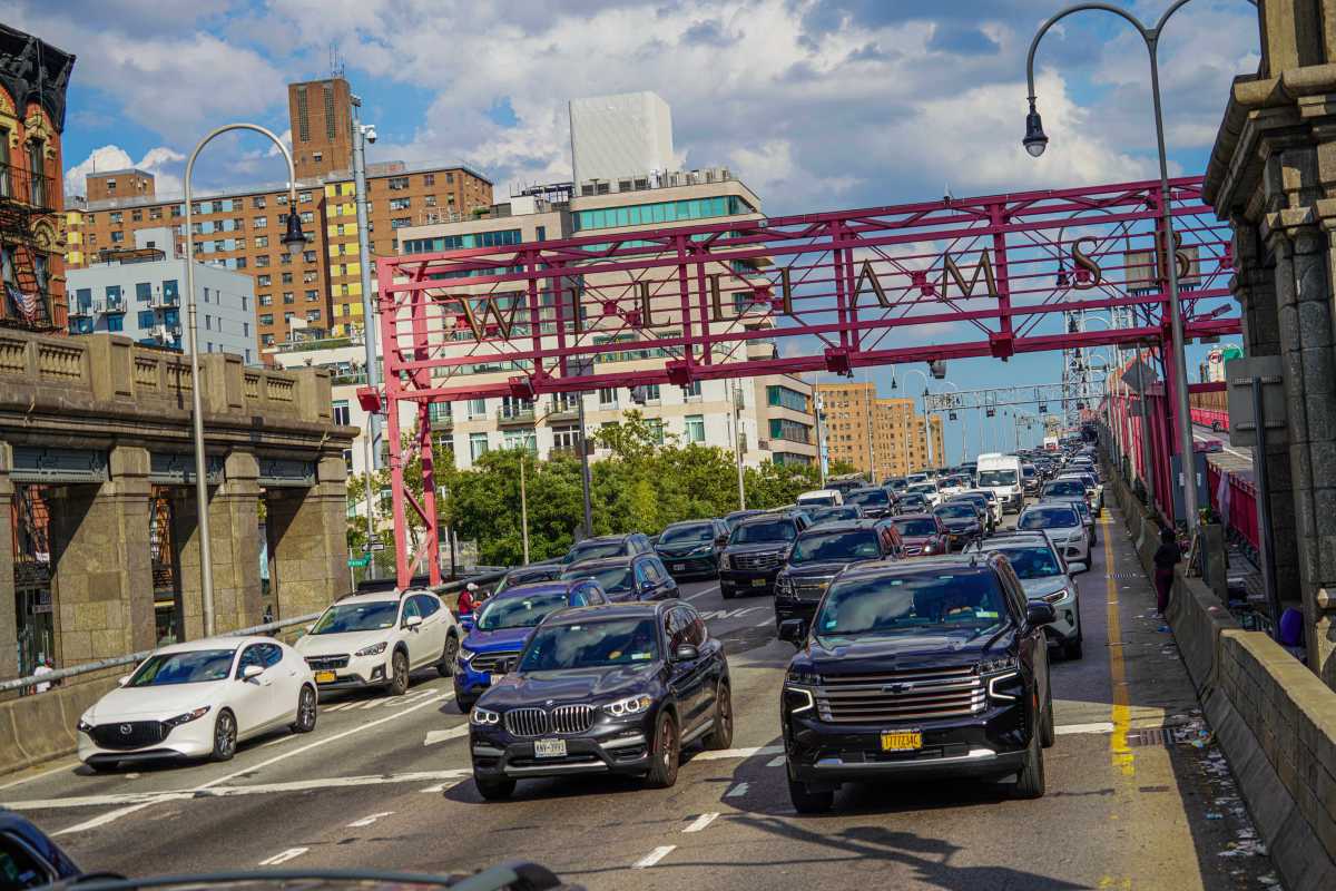 Drivers enter Manhattan from the Williamsburg Bridge.