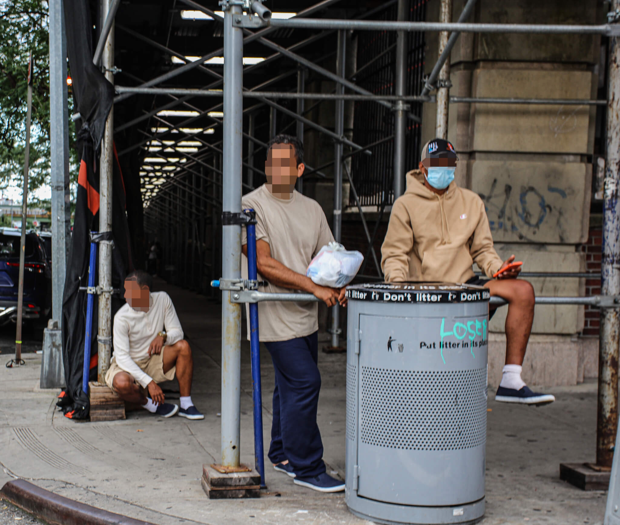 Homeless migrants left to sleep on Midtown streets as city shelters turn them away 9