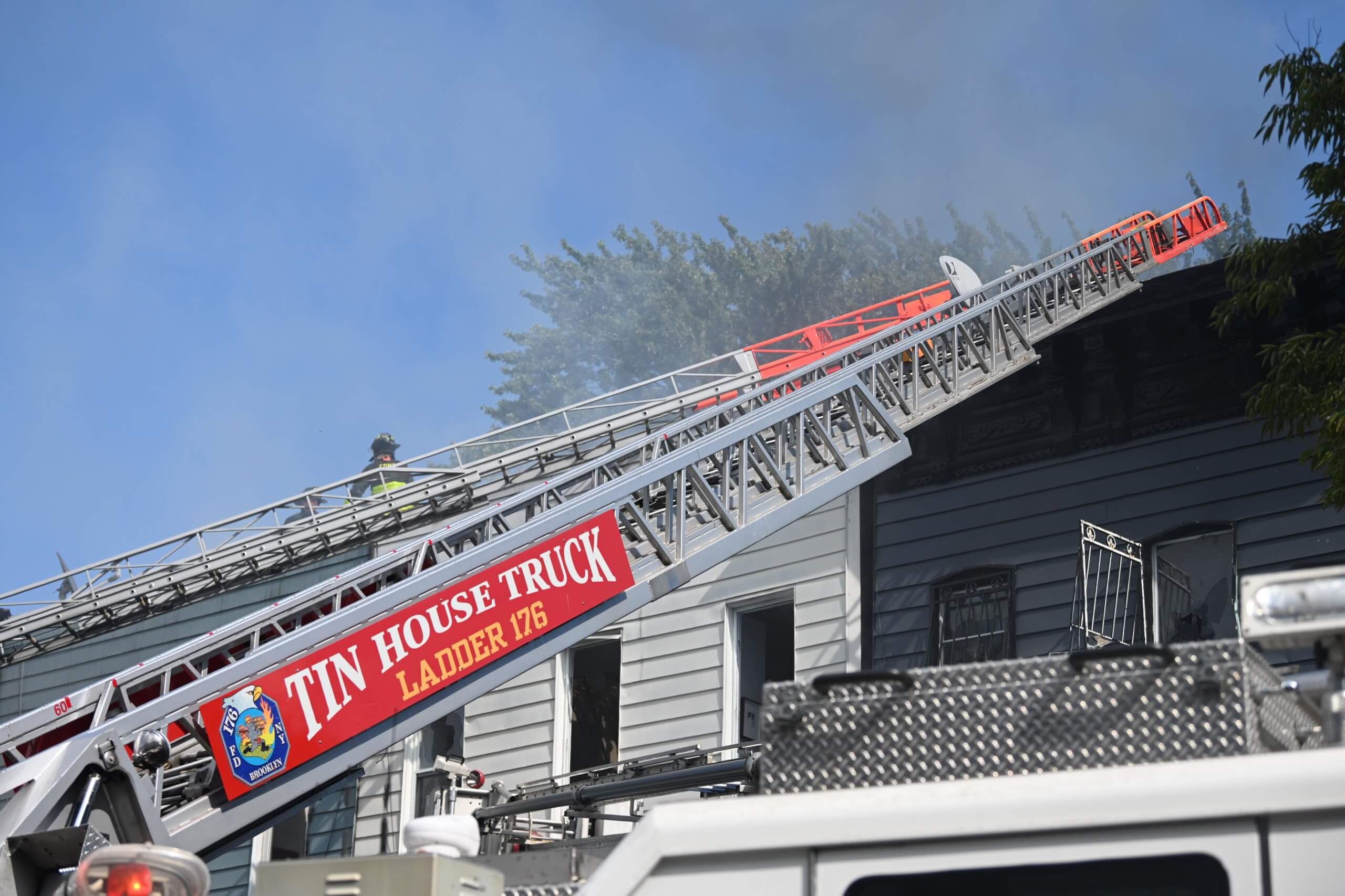 Firefighters take on four-alarm blaze at multiple Brooklyn homes 11