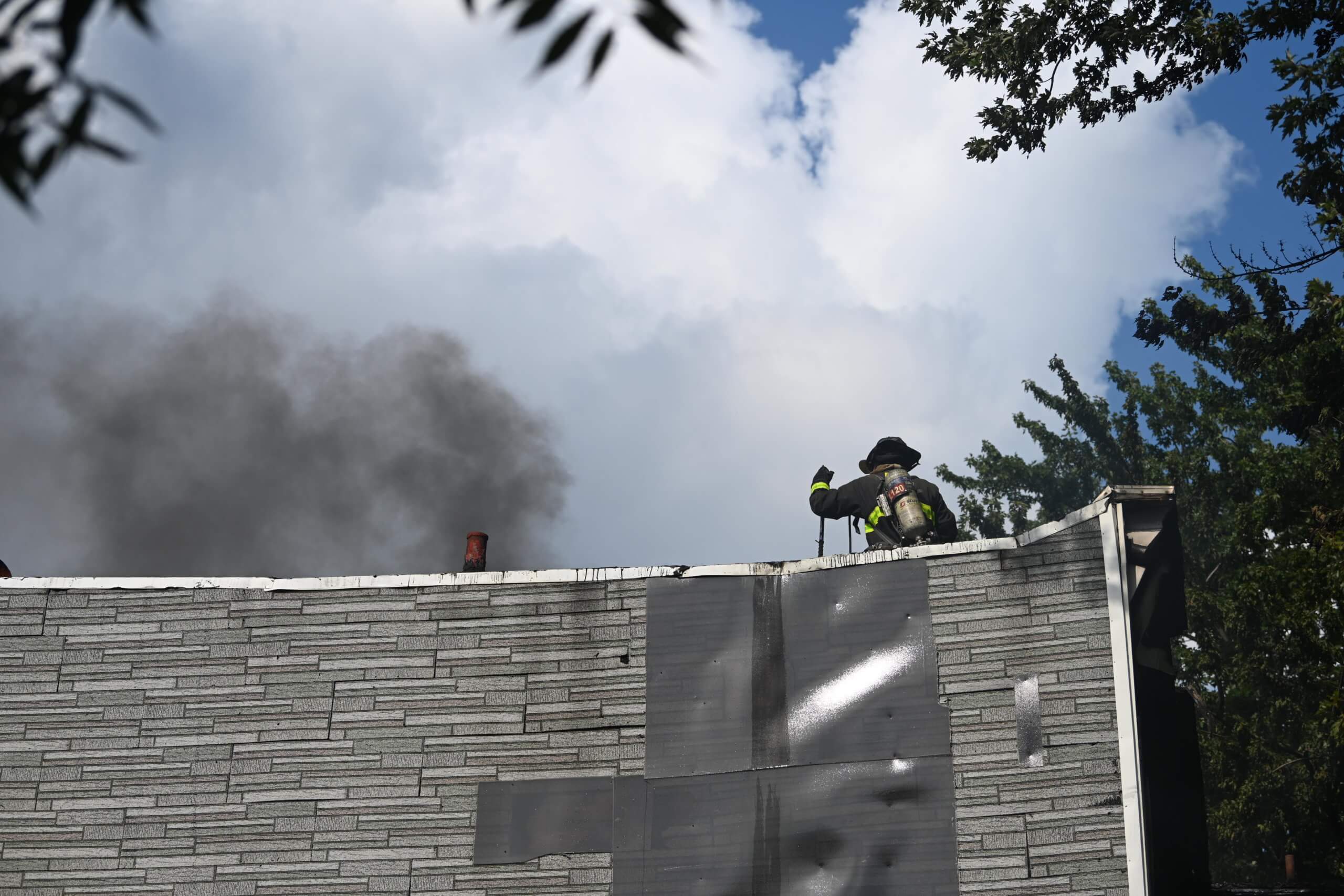Firefighters take on four-alarm blaze at multiple Brooklyn homes 13