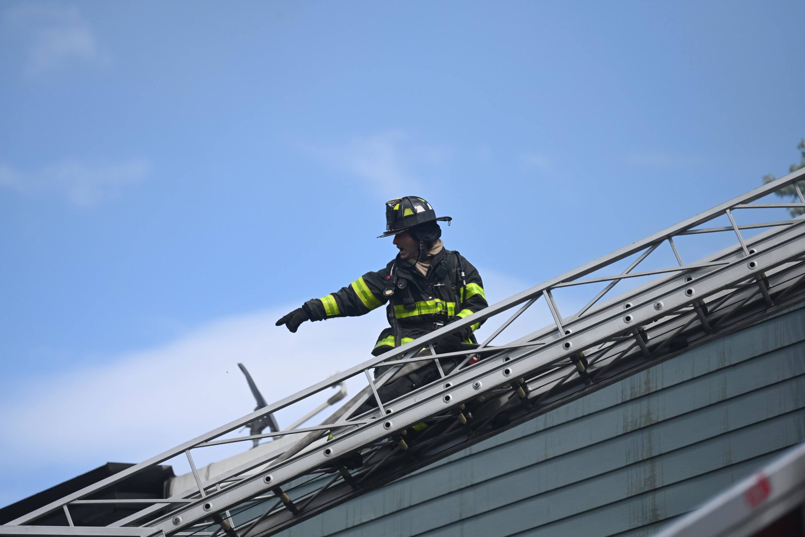 Firefighters take on four-alarm blaze at multiple Brooklyn homes 14