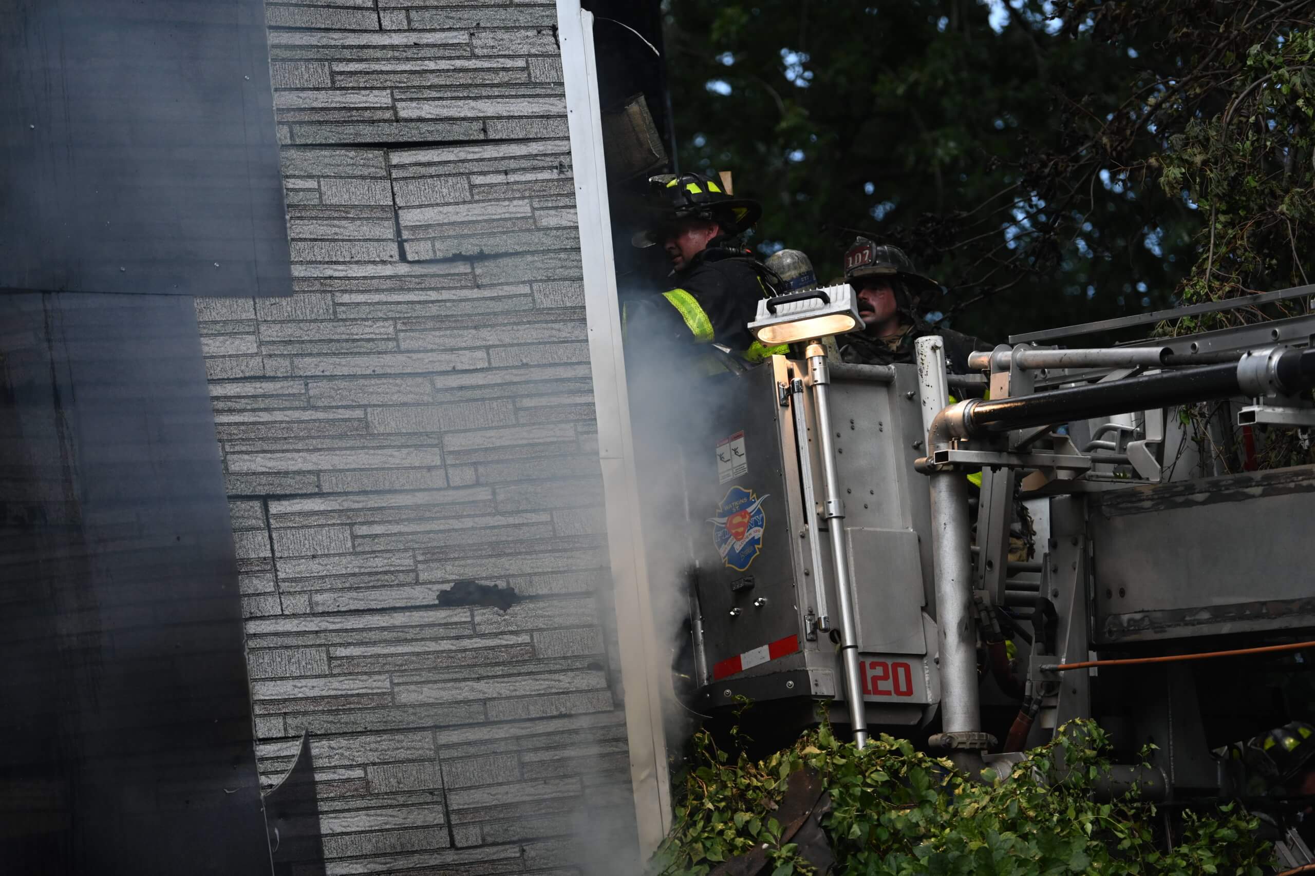 Firefighters take on four-alarm blaze at multiple Brooklyn homes 15